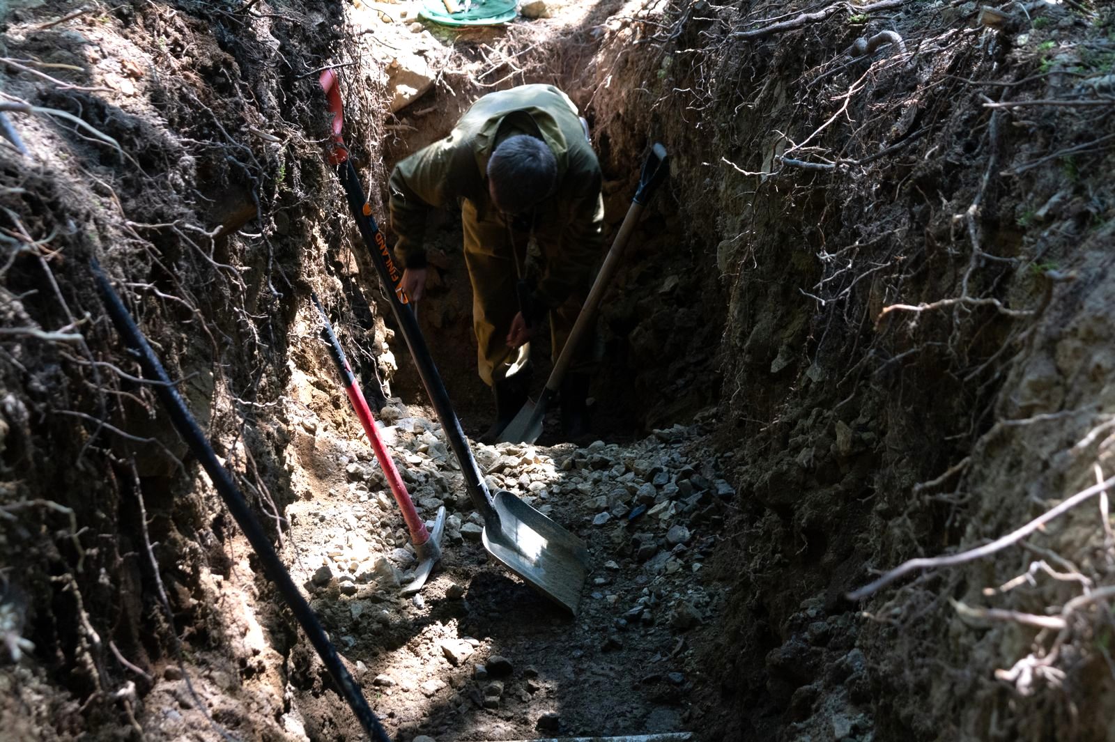 Septic system technician at work, Amarillo Septic Pumping